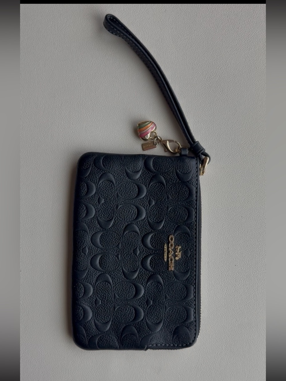 Coach Black Embossed Signature Wristlet with Gold Logo